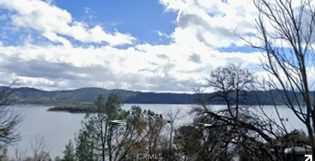 a view of a yard covered with snow