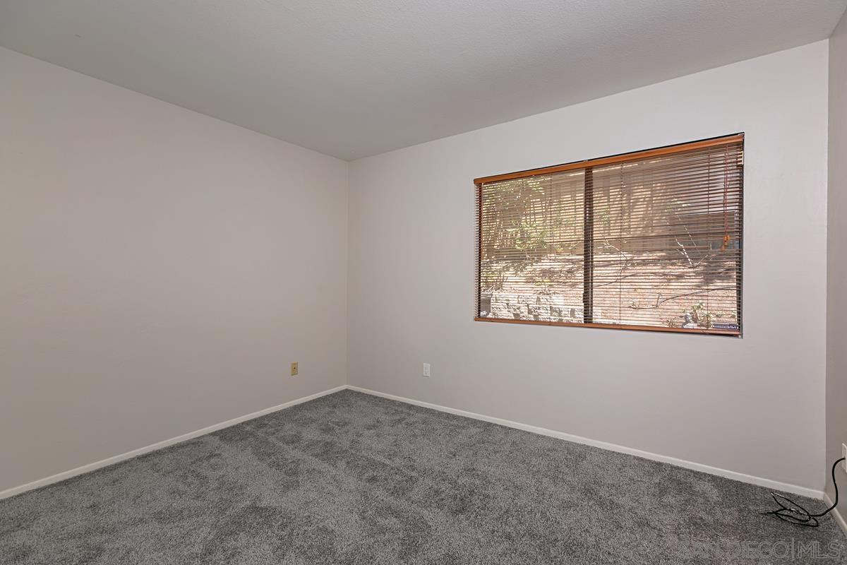 4031 Grayson Drive San Diego, CA 92130 - Photo 19 of 25 an empty room with a window