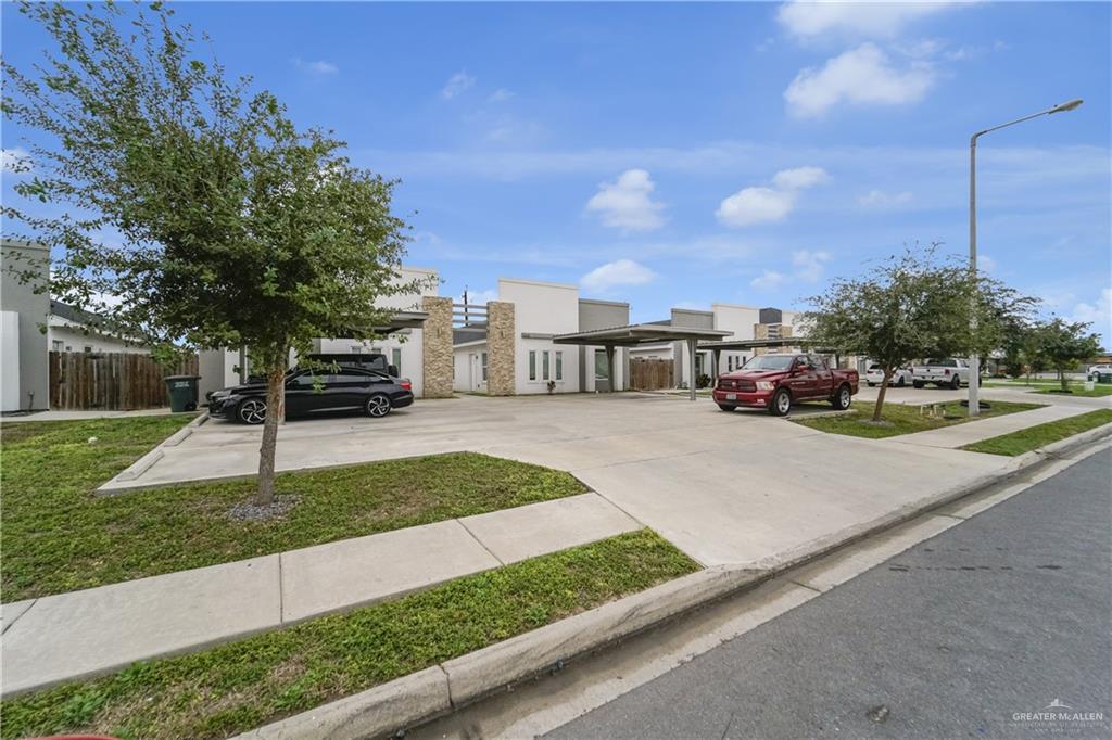 405 Rafael Drive San Juan, TX 78589 - Photo 3 of 13 a view of a street with houses