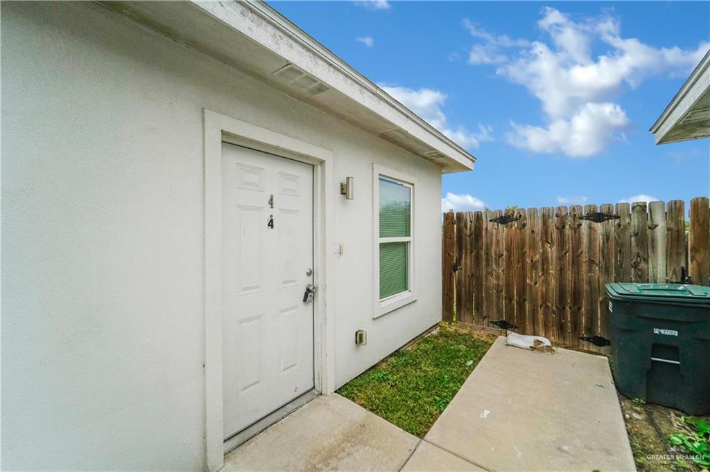 405 Rafael Drive San Juan, TX 78589 - Photo 5 of 13 a view of a back yard from a hallway