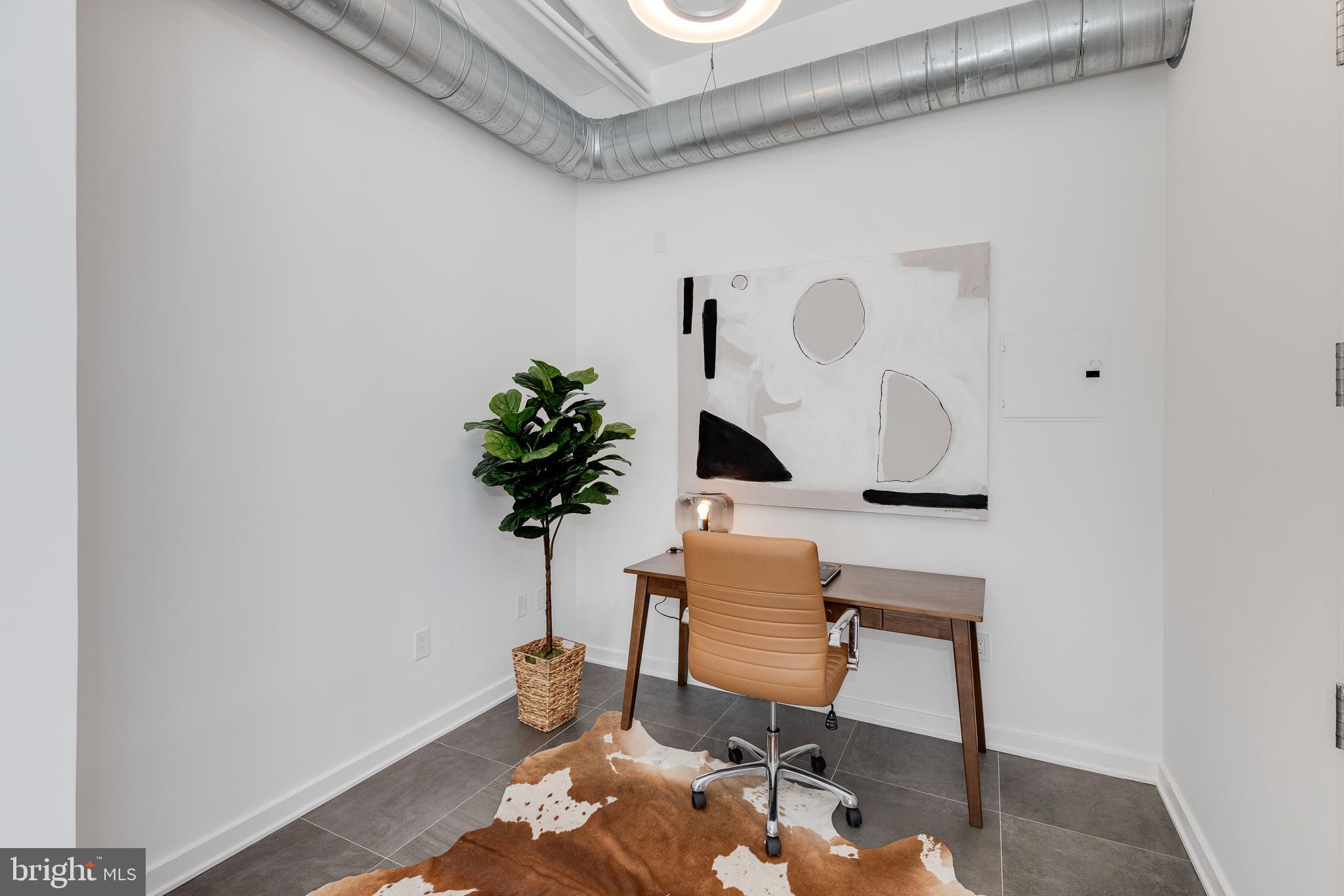 105-32 South 12th Street, Unit PH504 Philadelphia, PA 19107 - Photo 33 of 45 a view of a workspace with furniture