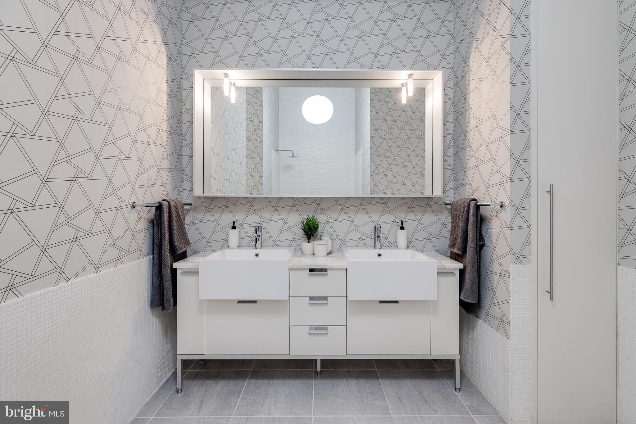 105-32 South 12th Street, Unit PH504 Philadelphia, PA 19107 - Photo 39 of 45 a utility room with dryer and washer