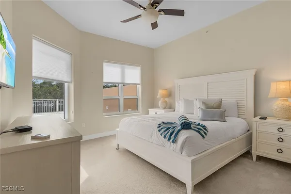 a bed room with a bed and a window