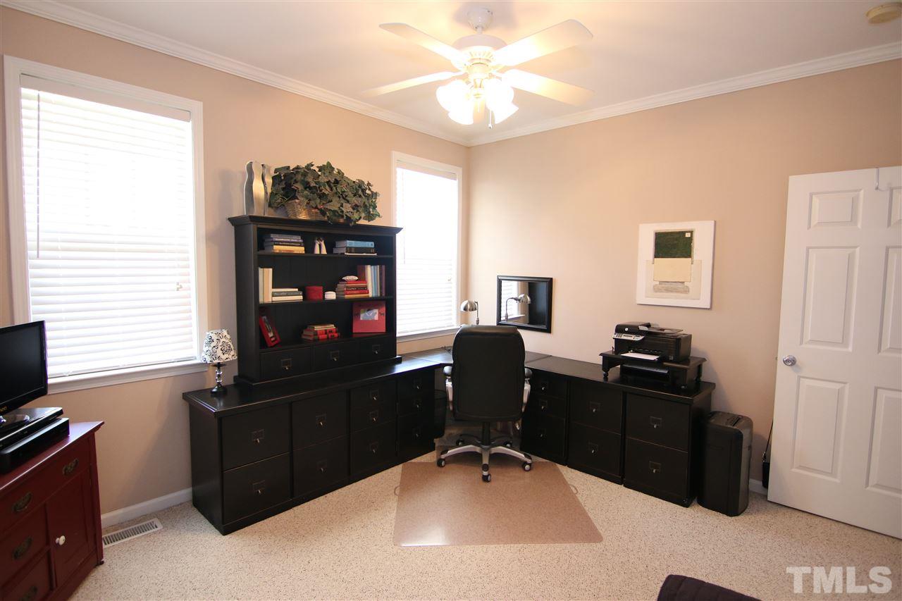 5976 Elevation Road Benson, NC 27504 - Photo 15 of 25 a room with a window and dresser