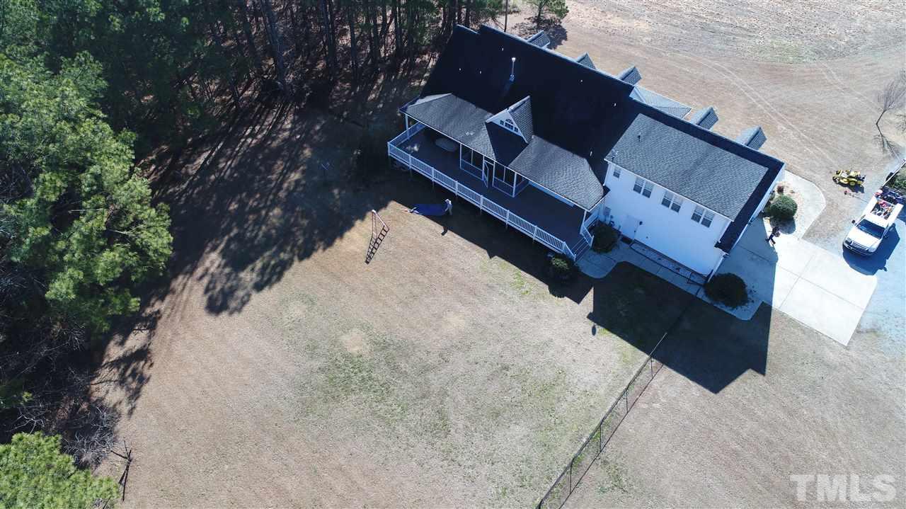5976 Elevation Road Benson, NC 27504 - Photo 25 of 25 an aerial view of houses with yard