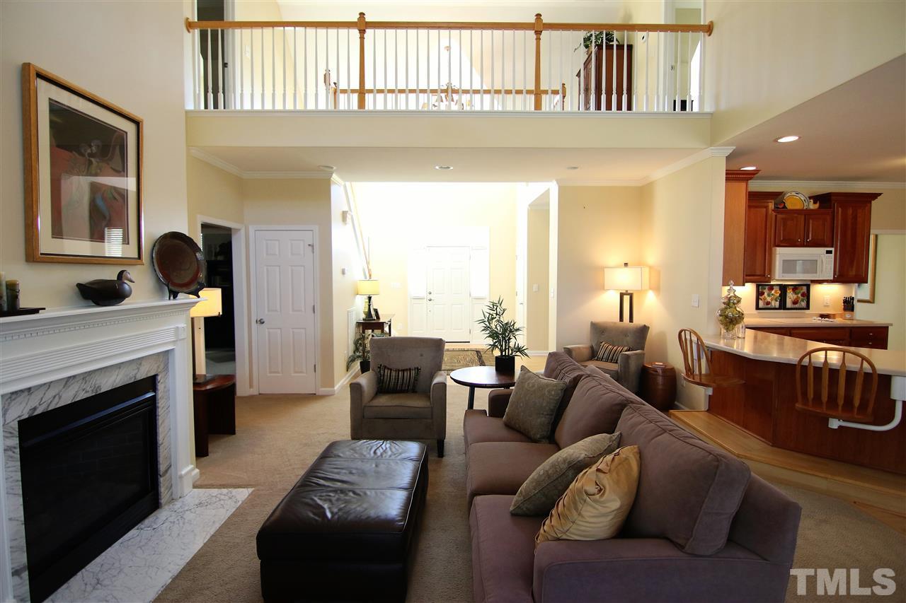 5976 Elevation Road Benson, NC 27504 - Photo 7 of 25 a living room with furniture fireplace and a window