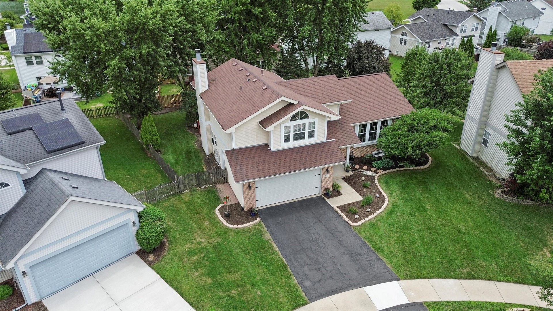 167 Forestview Court Aurora, IL 60502 - Photo 2 of 48 an aerial view of a house with a yard patio and a garden
