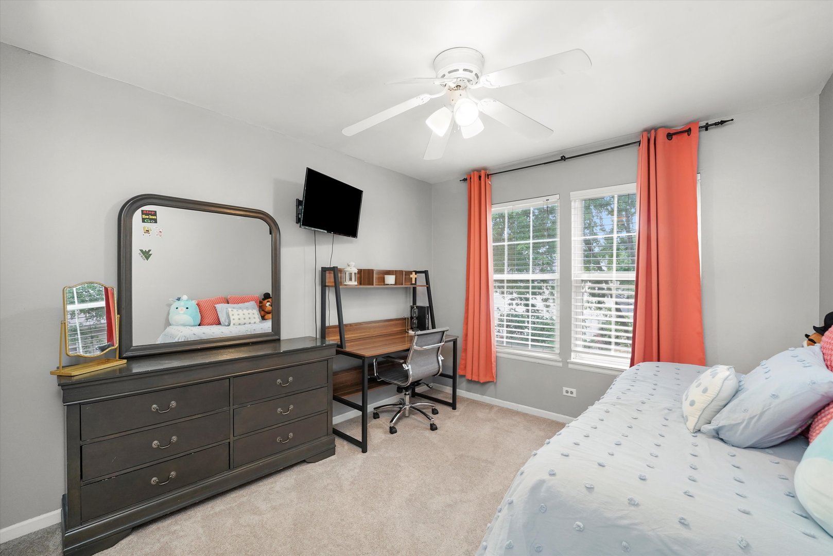 167 Forestview Court Aurora, IL 60502 - Photo 26 of 48 a bedroom with a bed and a chandelier