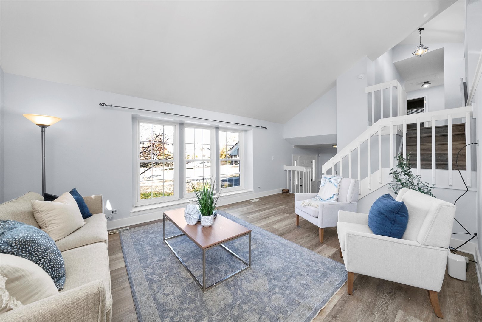 167 Forestview Court Aurora, IL 60502 - Photo 4 of 48 a living room with furniture and a large window