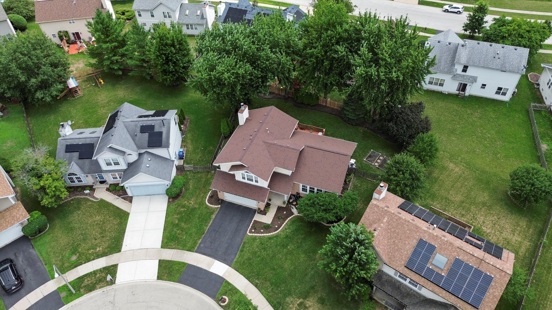 167 Forestview Court Aurora, IL 60502 - Photo 41 of 48 an aerial view of a house with outdoor space lake view and a sitting area