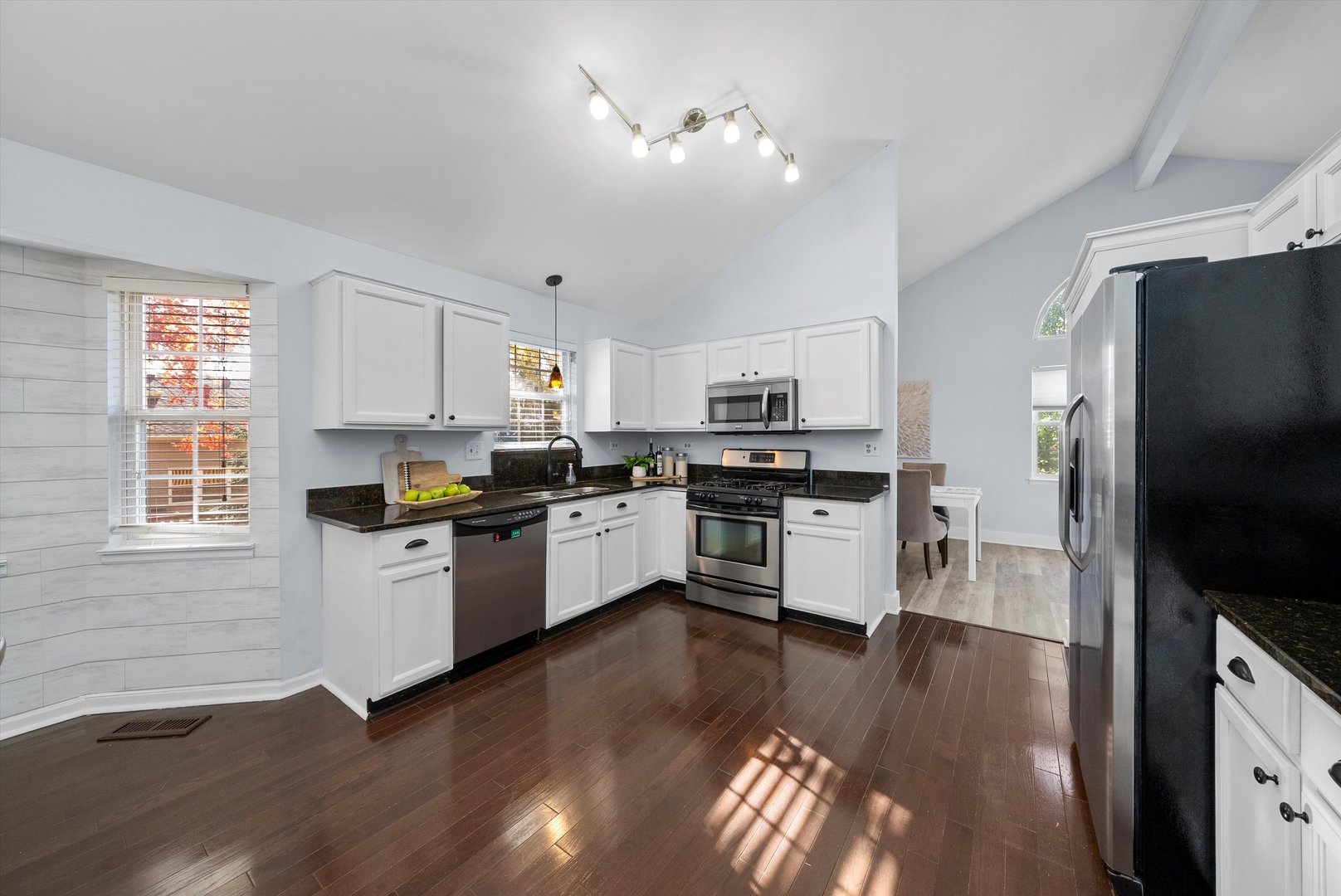 167 Forestview Court Aurora, IL 60502 - Photo 9 of 48 a kitchen with stainless steel appliances a refrigerator sink and microwave