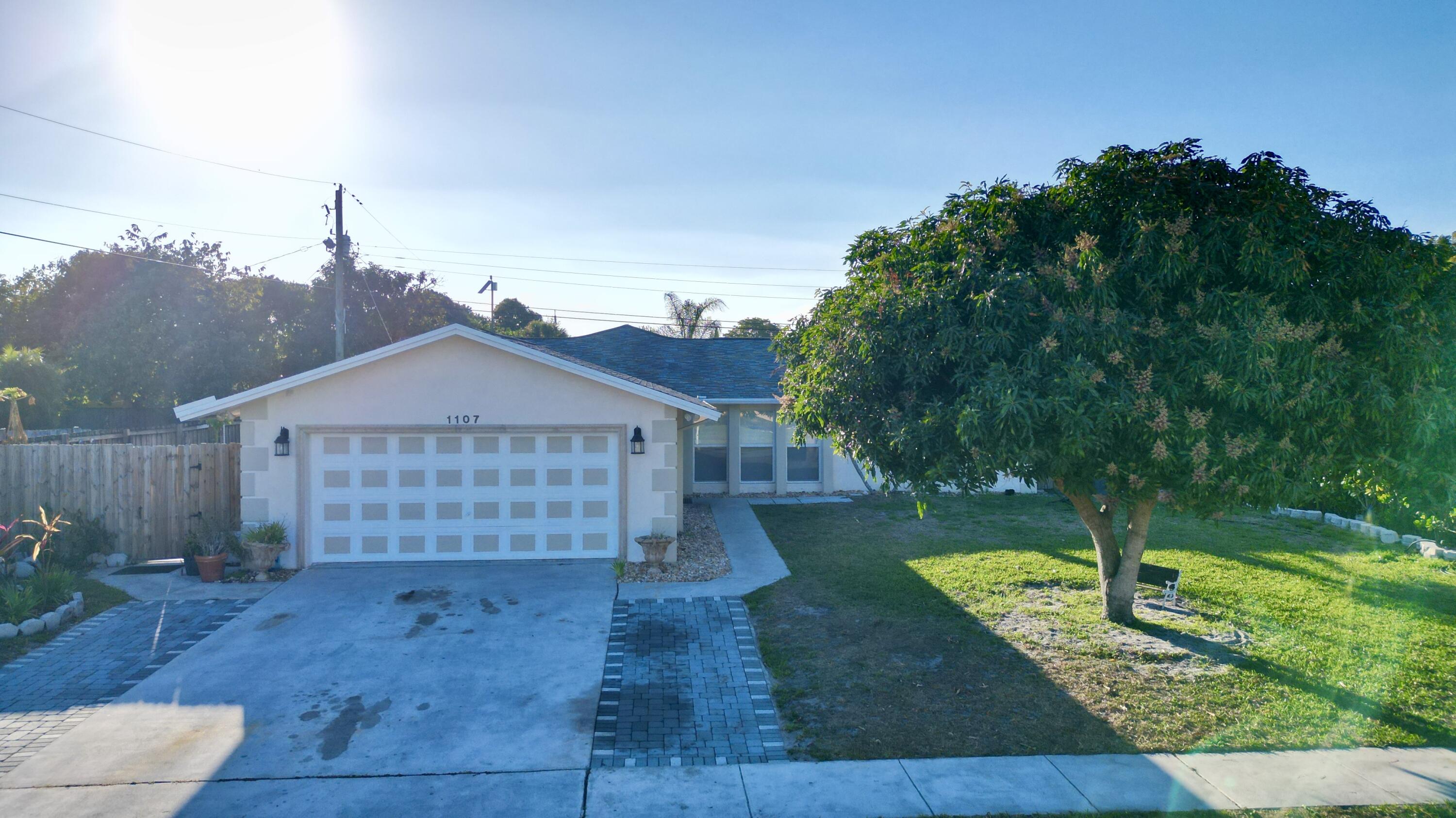 1107 Woodcrest Road West West Palm Beach, FL 33417 - Photo 3 of 64 2