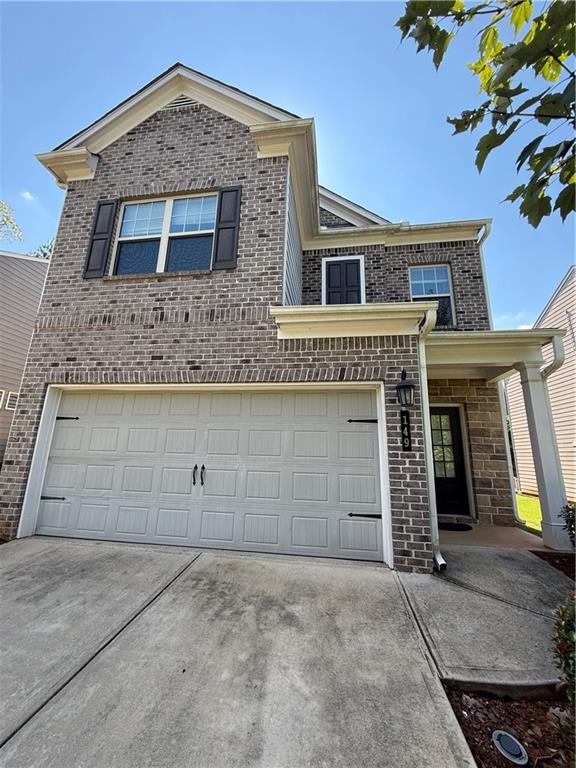 149 Hardy Water Drive Southeast Lawrenceville, GA 30045 - Photo 1 of 5 front view of a house