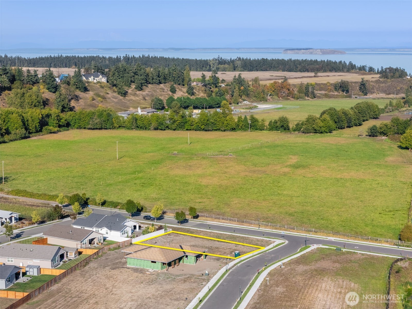 151 Dover Lane Sequim, WA 98382 - Photo 11 of 25 an aerial view of ocean and residential houses with outdoor space