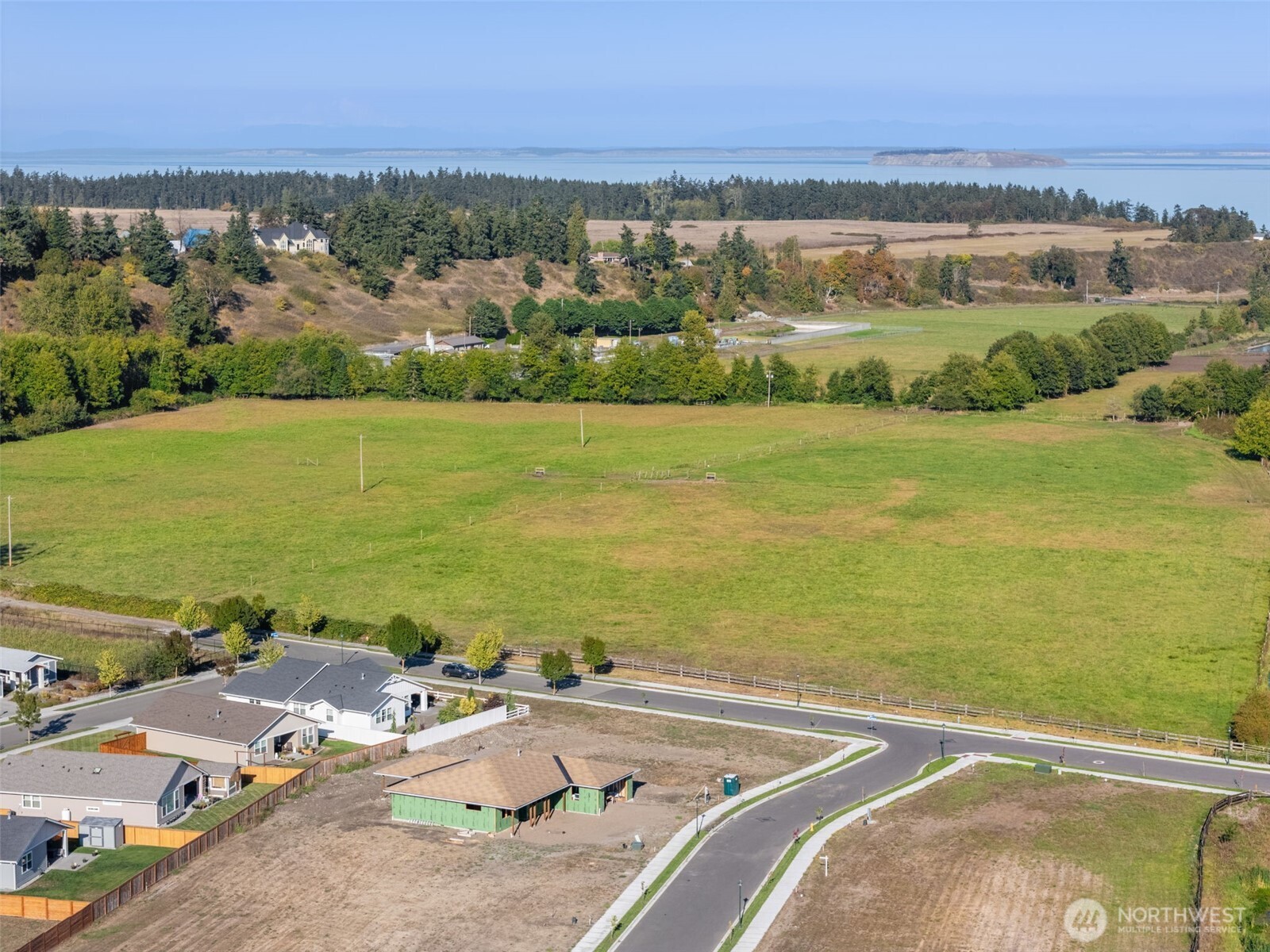 151 Dover Lane Sequim, WA 98382 - Photo 12 of 25 an aerial view of ocean and residential houses with outdoor space