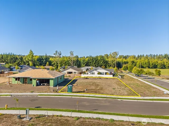 a view of city with ocean