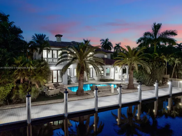 a view of a house with a swimming pool