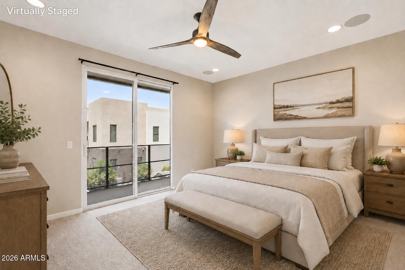 901 South Smith Road, Unit 1038 Tempe, AZ 85281 - Photo 14 of 29 a bedroom with a large bed and a chandelier