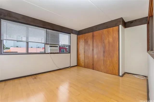 a view of a room with a large window