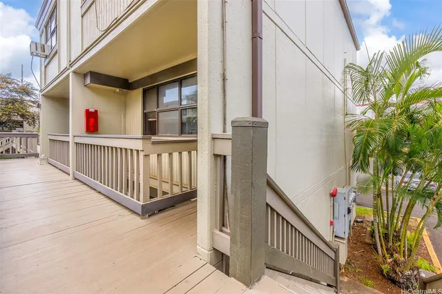a view of balcony with small garden