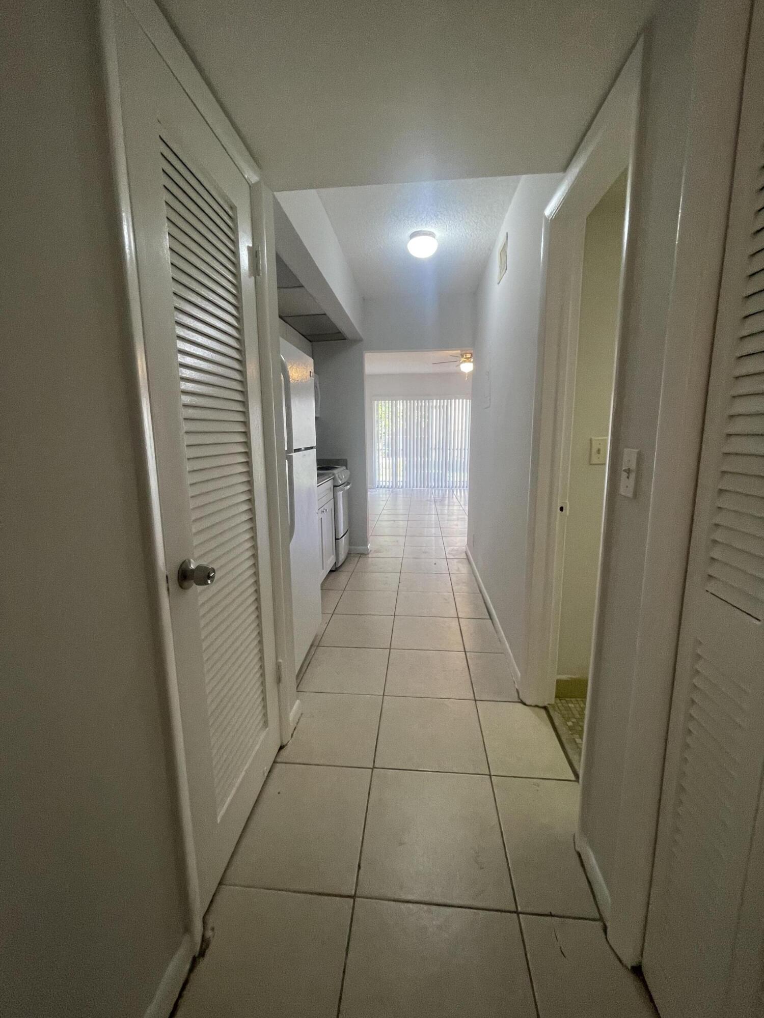 628 Northwest 13th Street, Unit 12 Boca Raton, FL 33486 - Photo 4 of 11 IMG_1896