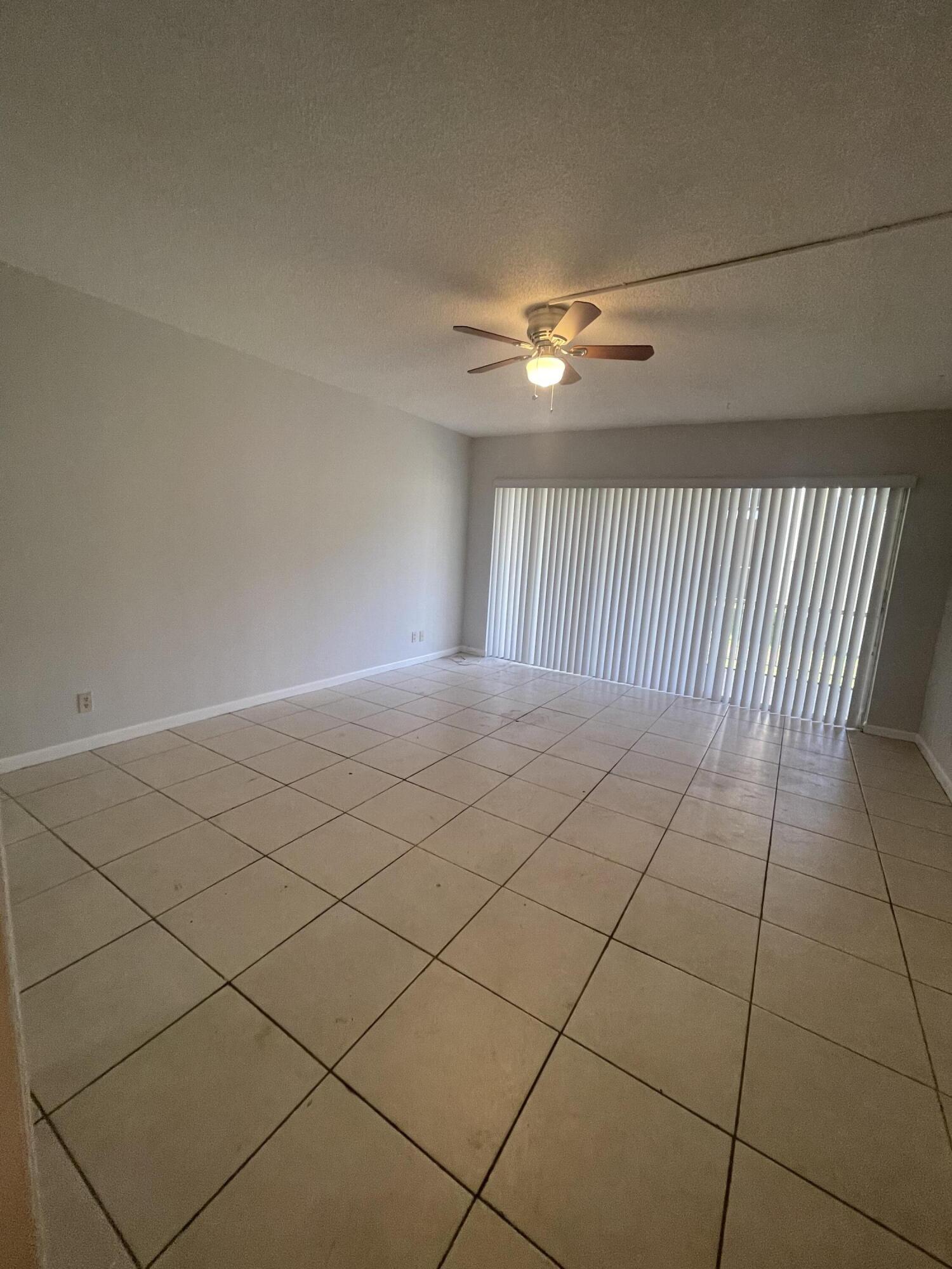 628 Northwest 13th Street, Unit 12 Boca Raton, FL 33486 - Photo 5 of 11 IMG_1901