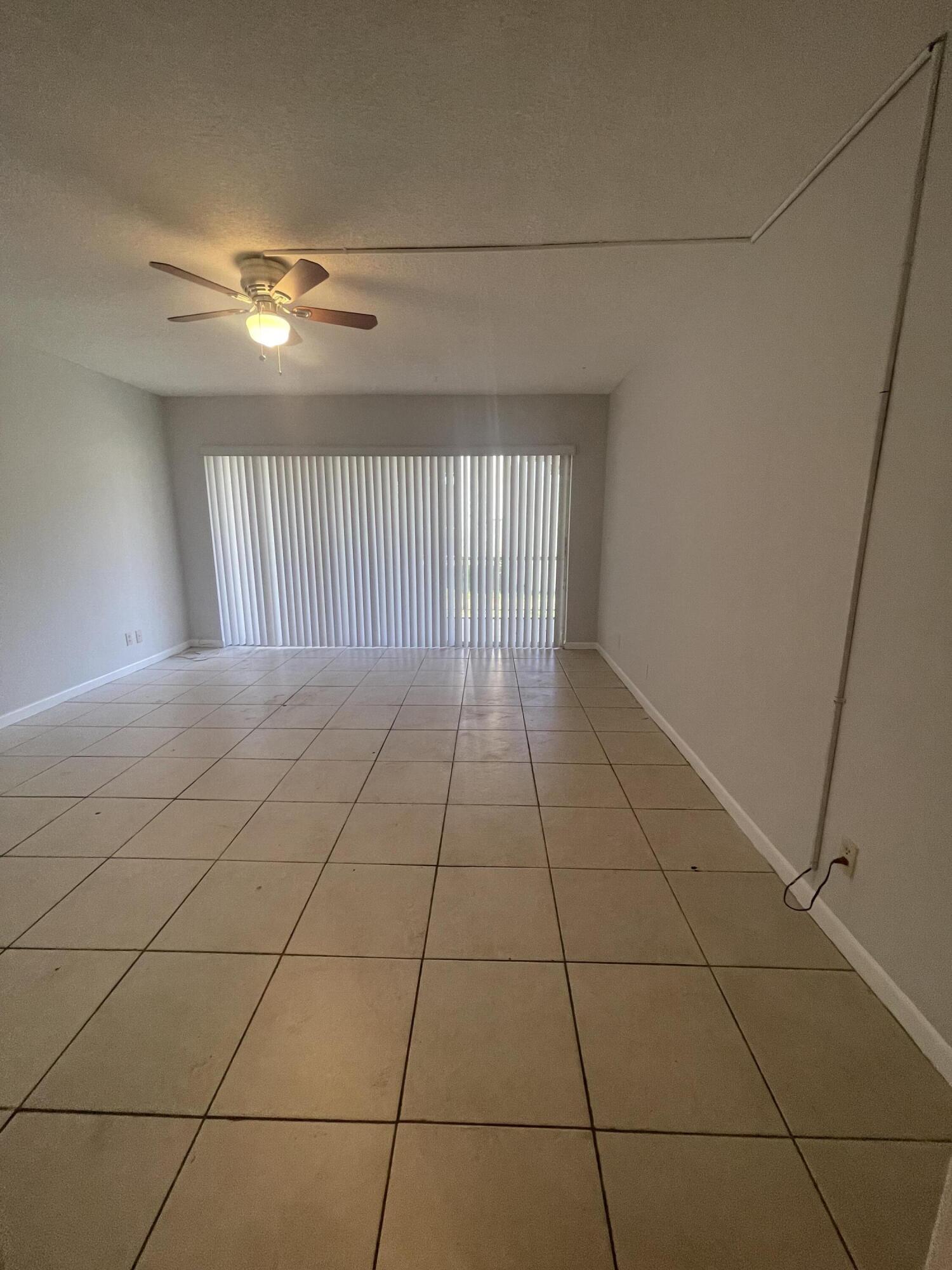 628 Northwest 13th Street, Unit 12 Boca Raton, FL 33486 - Photo 6 of 11 IMG_1902