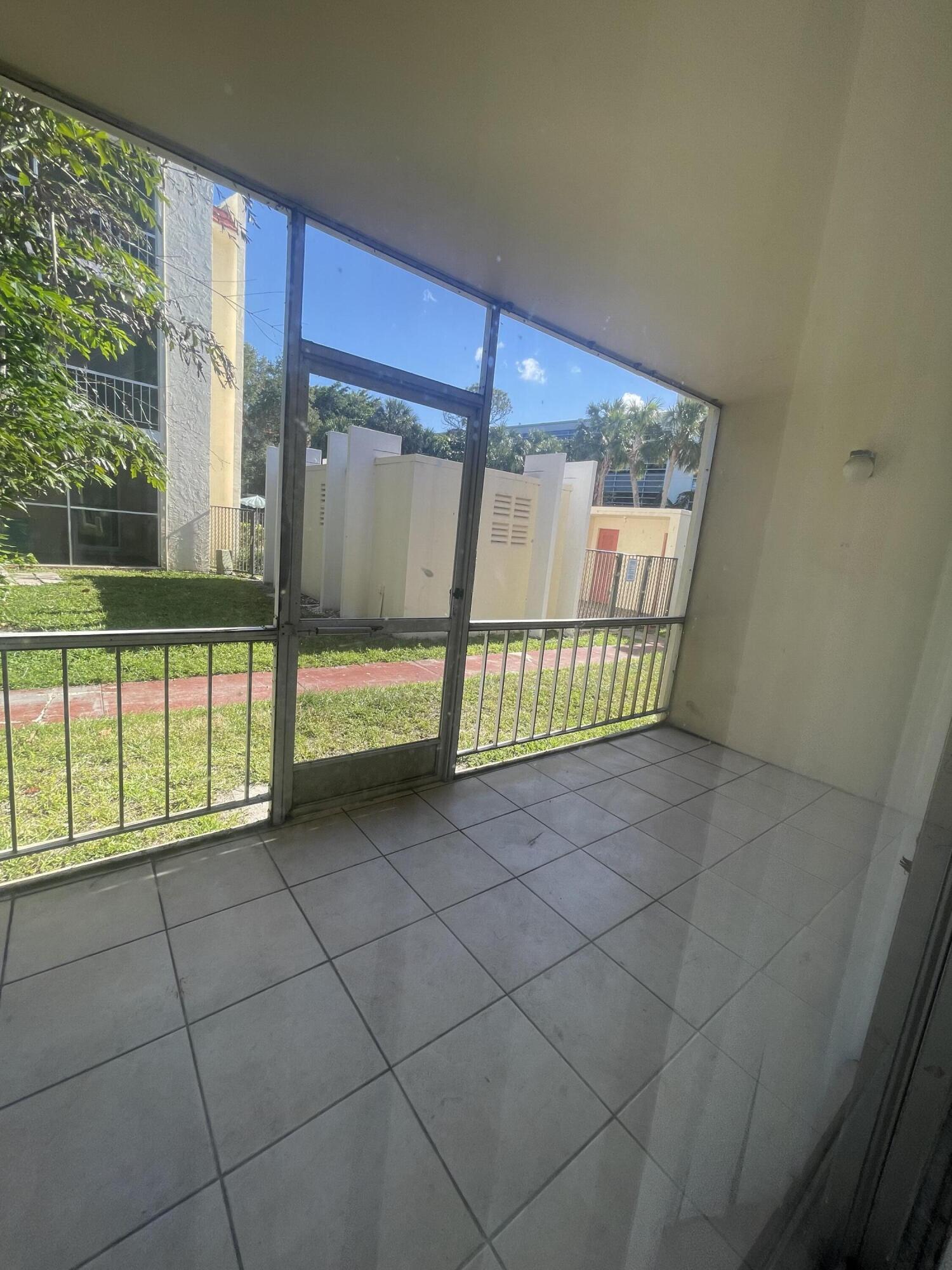 628 Northwest 13th Street, Unit 12 Boca Raton, FL 33486 - Photo 7 of 11 IMG_1903