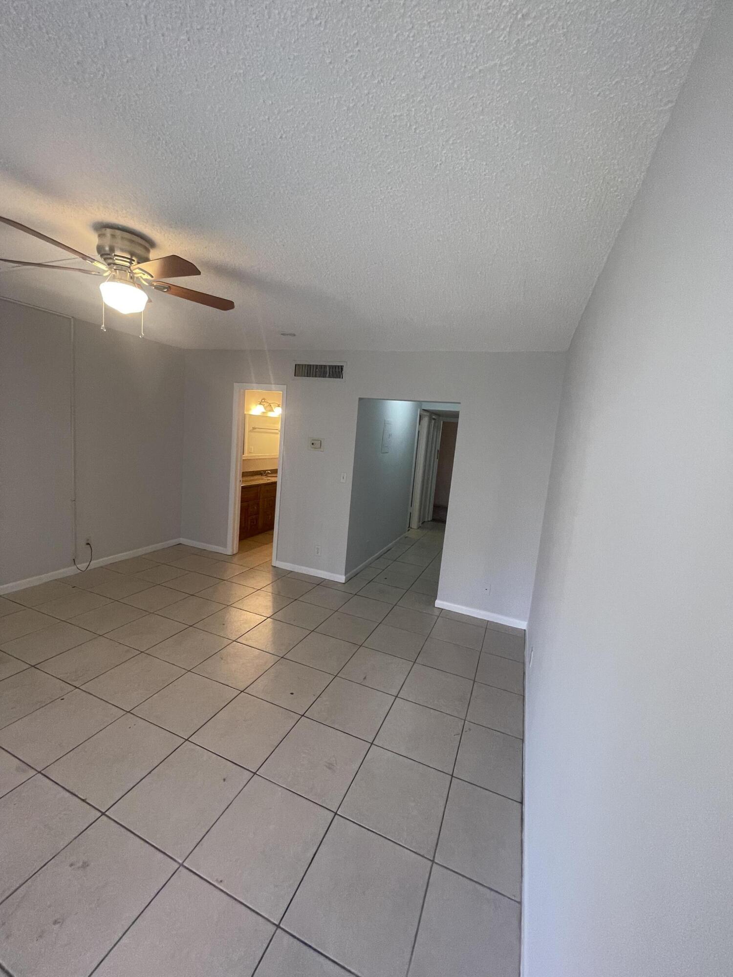 628 Northwest 13th Street, Unit 12 Boca Raton, FL 33486 - Photo 8 of 11 IMG_1905