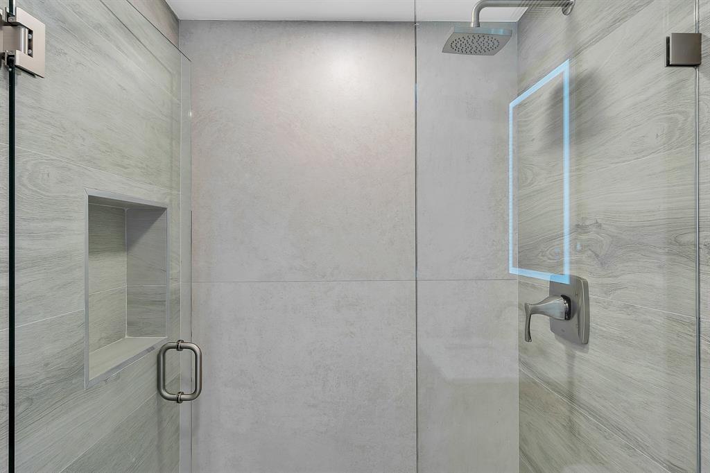 9818 Marina Boulevard, Unit 1225 Boca Raton, FL 33428 - Photo 9 of 17 a bathroom with a shower