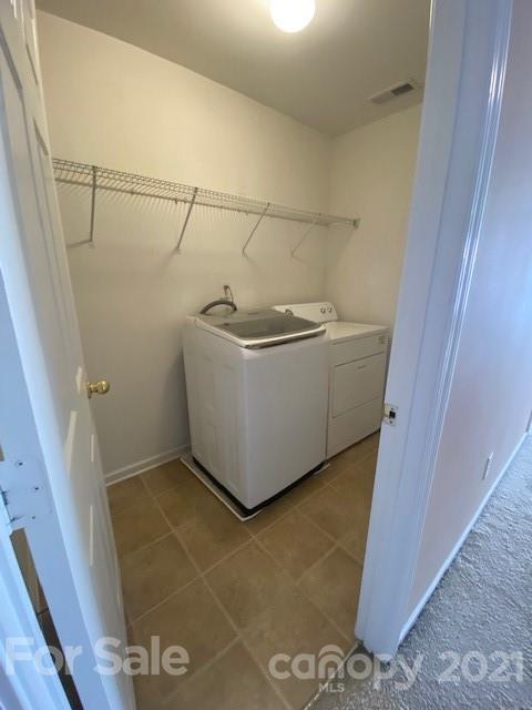 1002 Yellow Bee Road Indian Trail, NC 28079 - Photo 13 of 23 a utility room with dryer and washer