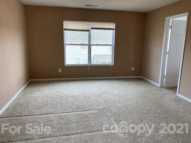 1002 Yellow Bee Road Indian Trail, NC 28079 - Photo 15 of 23 an empty room with large window