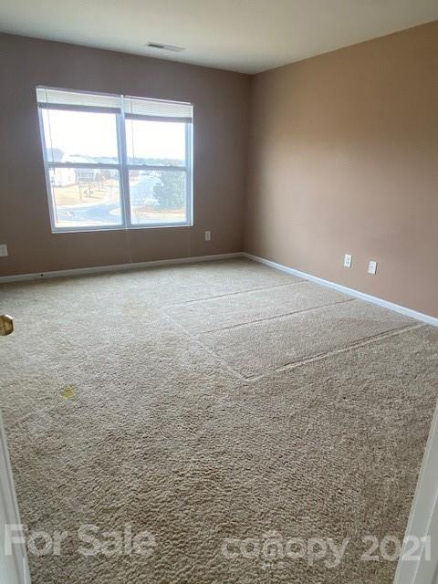 1002 Yellow Bee Road Indian Trail, NC 28079 - Photo 23 of 23 a view of an empty room with a window