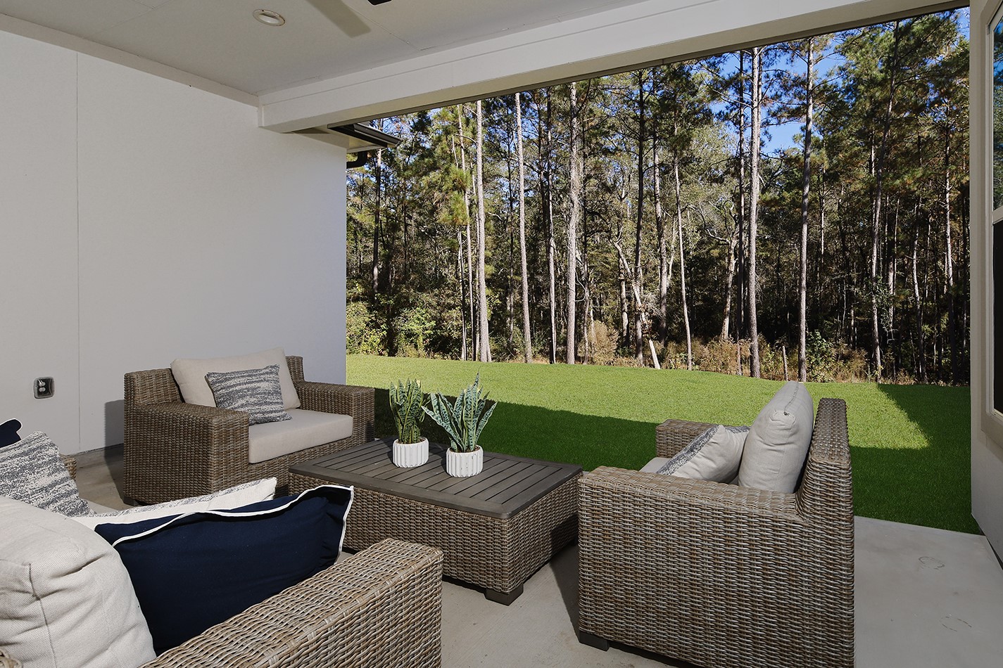 630 Lonestar Road Huntsville, TX 77340 - Photo 41 of 48 a view of a patio with couches chairs and a yard