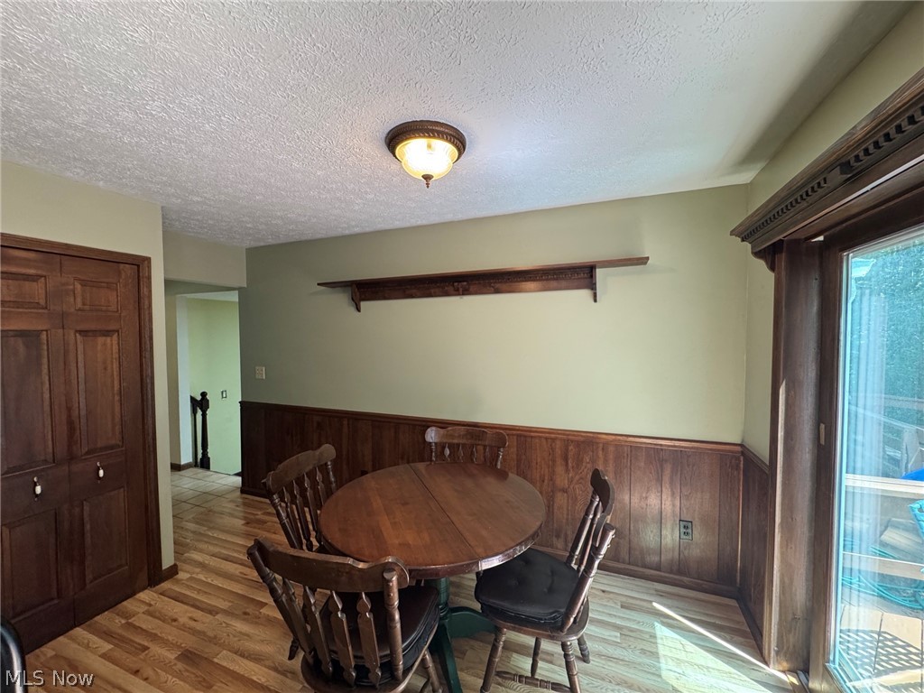 8201 Orchard Road Painesville, OH 44077 - Photo 13 of 45 Dining area featuring access to wood deck