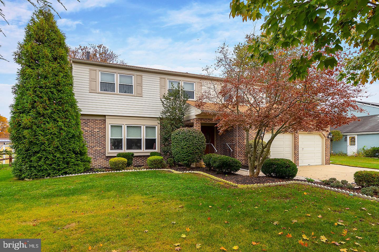 75 Freedom Road Sewell, NJ 08080 - Photo 1 of 21 a view of a house with a yard and plants