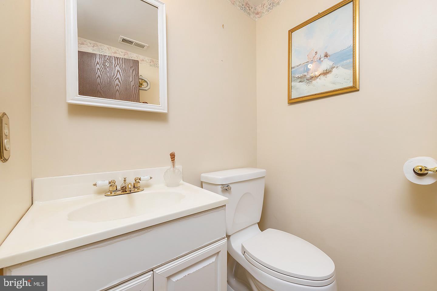 75 Freedom Road Sewell, NJ 08080 - Photo 11 of 21 a white toilet sitting next to a bathroom sink