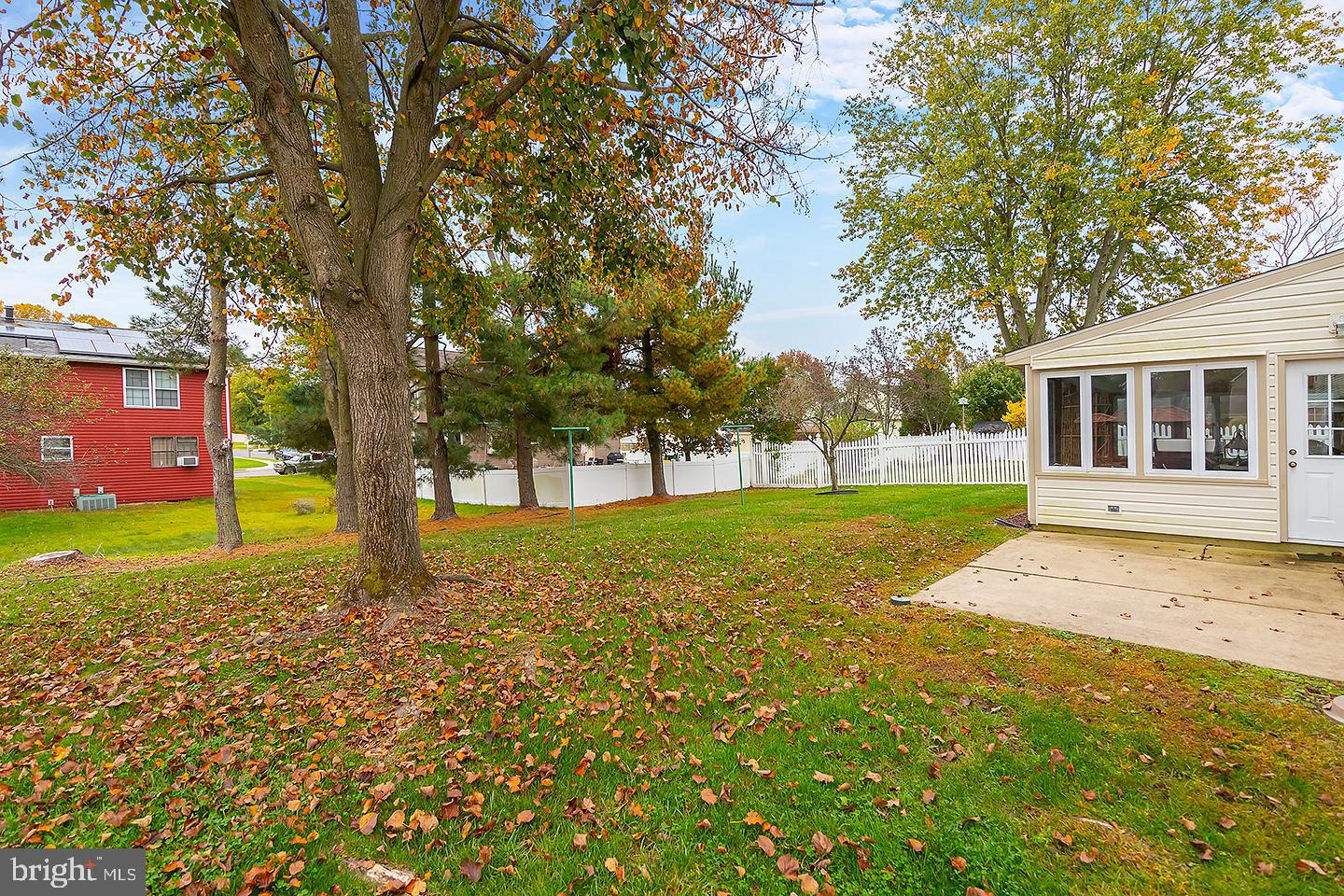 75 Freedom Road Sewell, NJ 08080 - Photo 20 of 21 a view of a house with backyard and tree