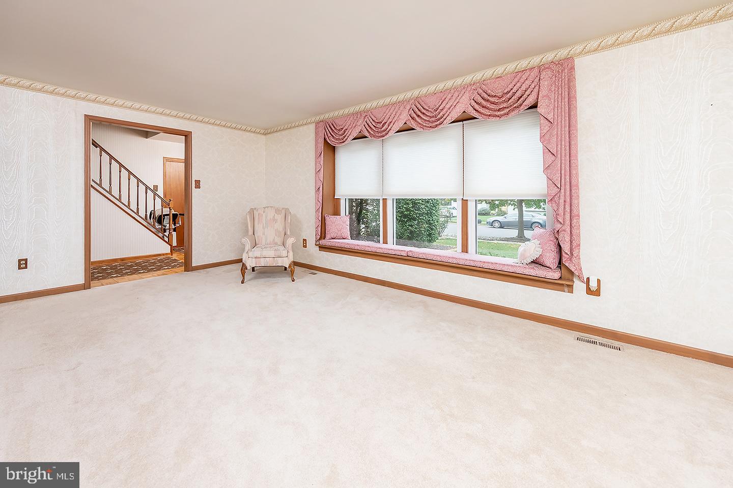 75 Freedom Road Sewell, NJ 08080 - Photo 4 of 21 a view of a livingroom with furniture and a window