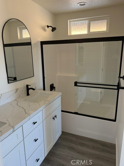 16196 Rancherias Road Apple Valley, CA 92307 - Photo 16 of 19 a bathroom with a sink and a mirror