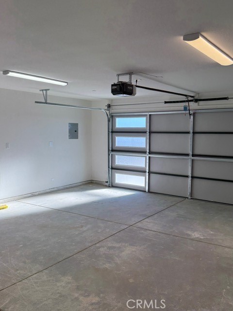16196 Rancherias Road Apple Valley, CA 92307 - Photo 19 of 19 a view of an empty room with stairs and a window