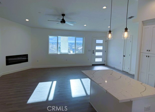 16196 Rancherias Road Apple Valley, CA 92307 - Photo 9 of 19 an empty room with windows