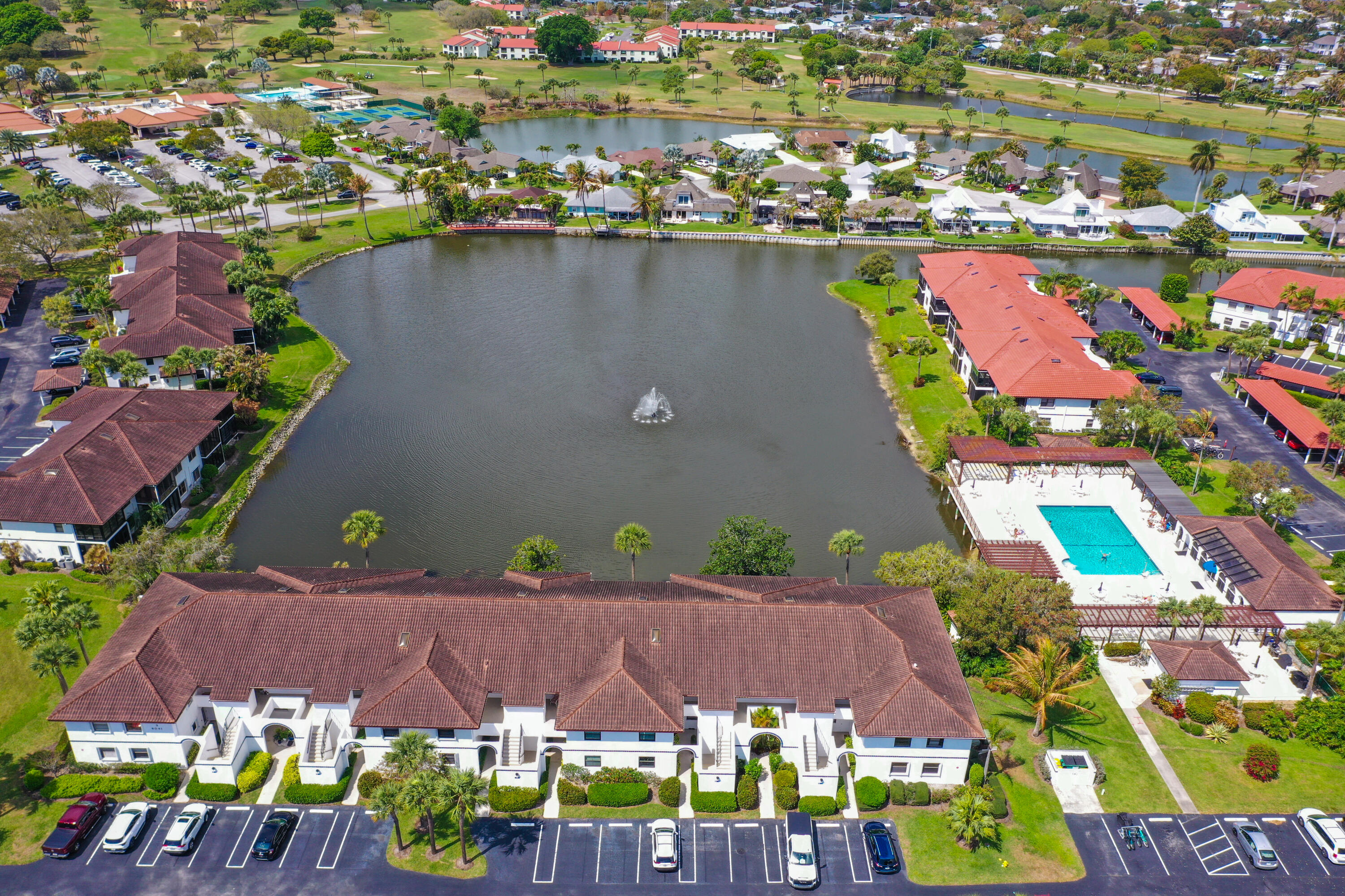 6041 Southeast Landing Way Stuart, FL 34997 - Photo 24 of 30 an aerial view of a house with a swimming pool