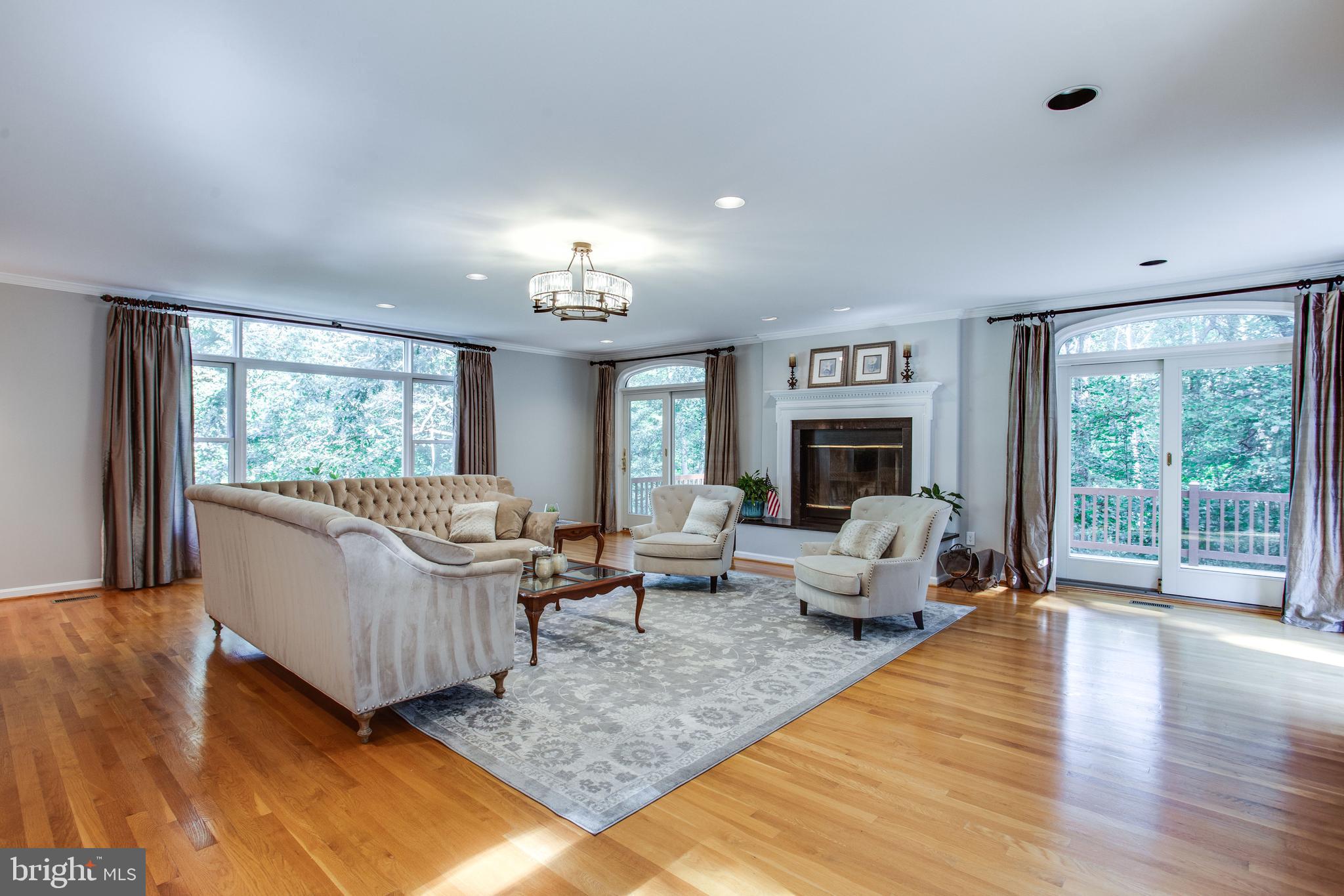 3113 Fox Mill Road Oakton, VA 22124 - Photo 8 of 64 Great Room w Multiple Doors to Wraparound Deck.