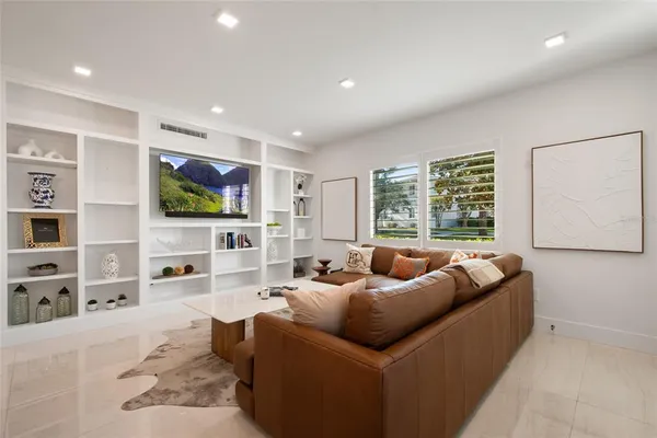 a room with furniture and a window