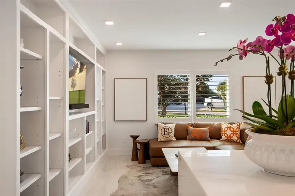 a kitchen with a table and chairs in it