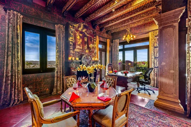 a front view of a house with parking space