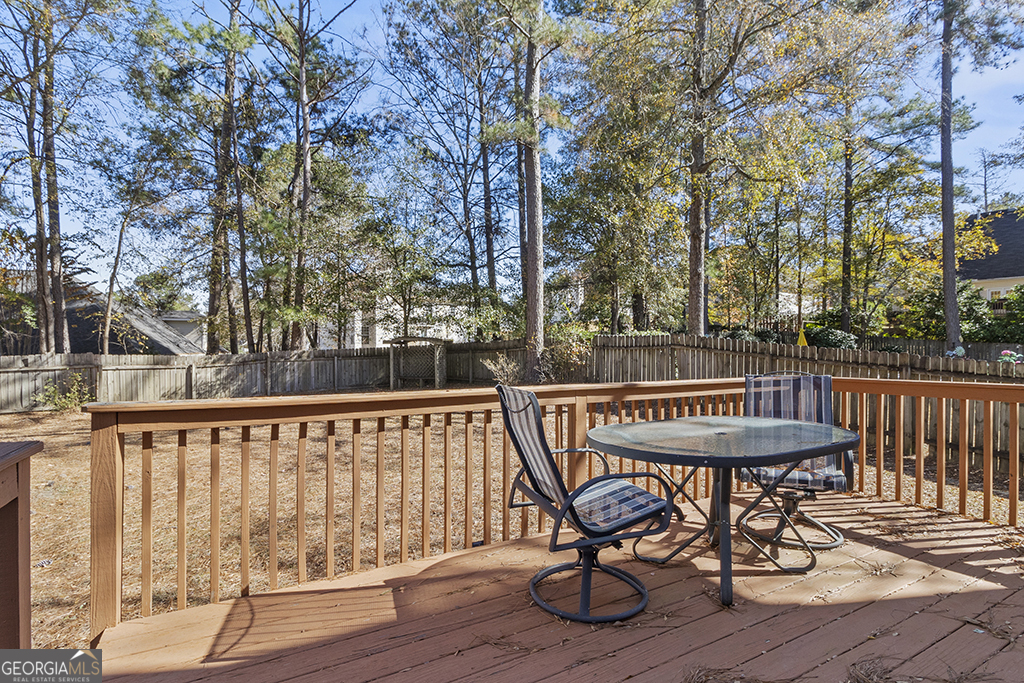 643 Millrun Court Macon, GA 31210 - Photo 18 of 45 a view of balcony with wooden floor and outdoor seating