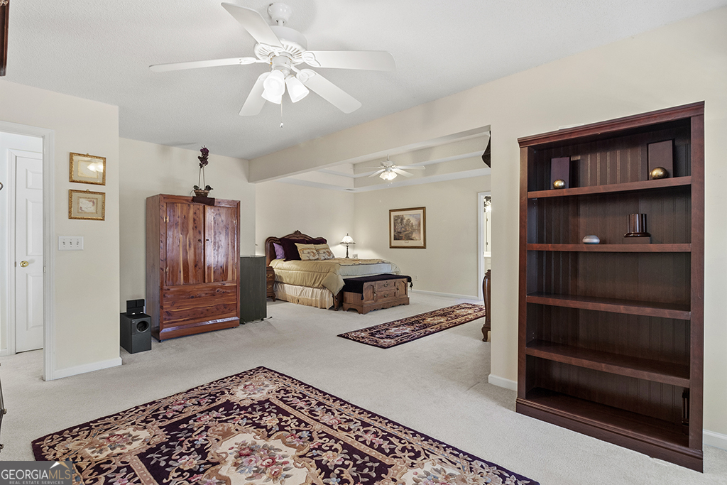 643 Millrun Court Macon, GA 31210 - Photo 39 of 45 a living room with furniture and a rug