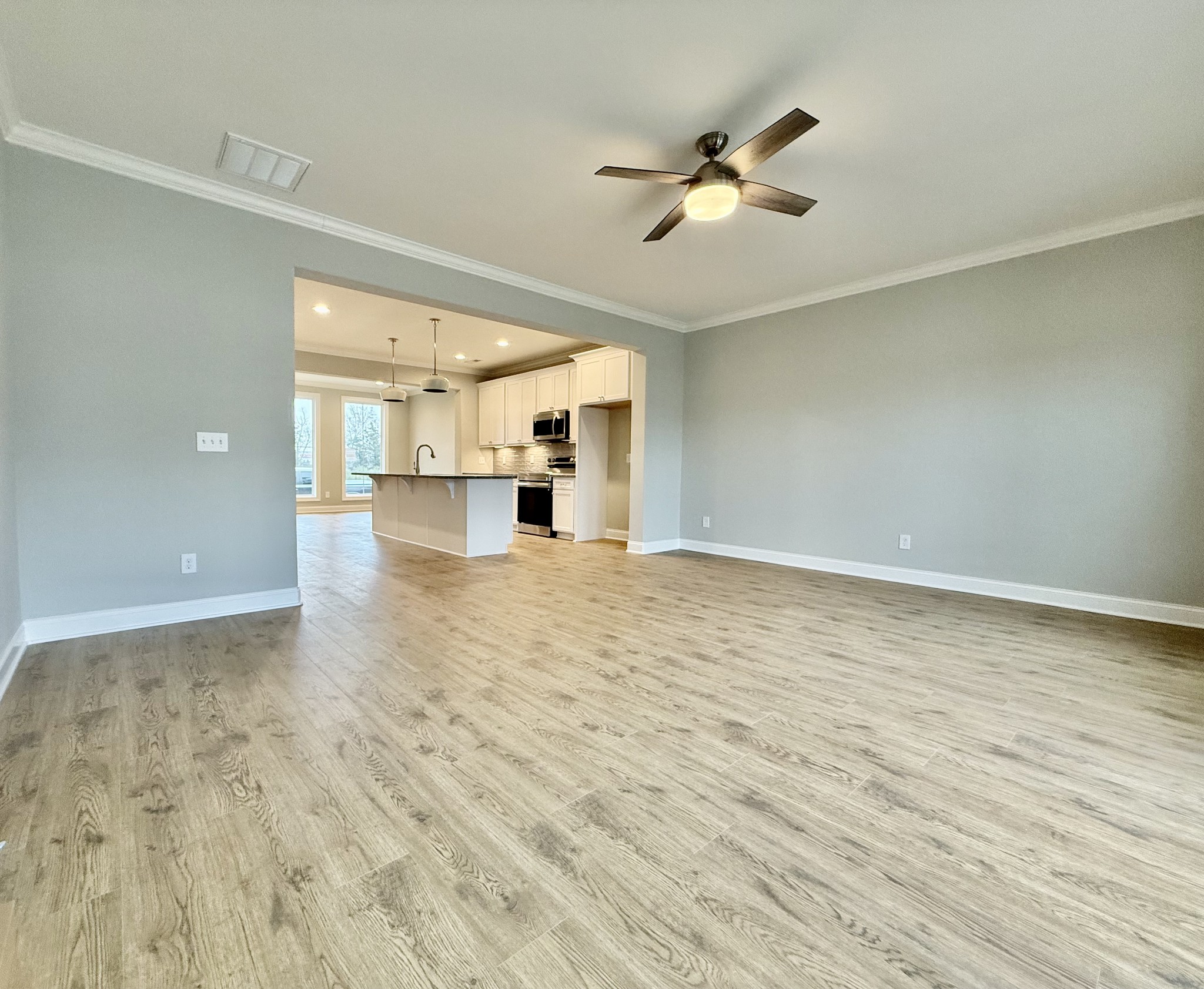 1365 Rebecca Johns Drive Murfreesboro, TN 37128 - Photo 20 of 31 an empty room with wooden floor and windows